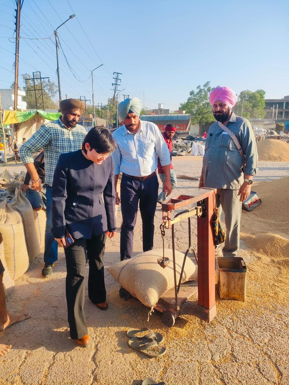 ADC Poonam Singh visits grain market, directs officials to ensure prompt procurement and lifting of wheat